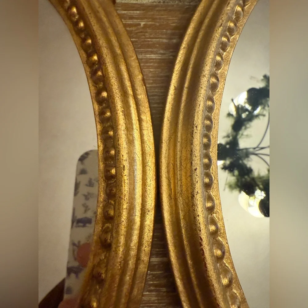 PAIR OF VINTAGE ITALIAN GILT OVAL MIRRORS, DECORATIVE KRAFTS INC.